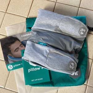 TRTL PILLOW PLUS adjustable travel neck pillow.